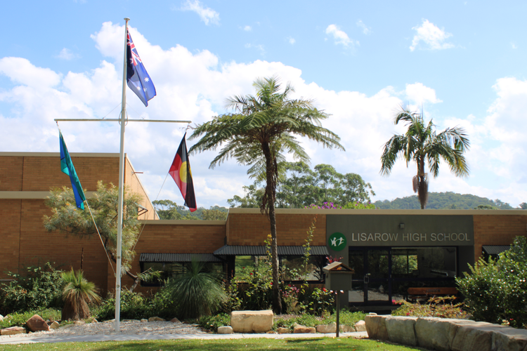 Front of school - administration office with flags